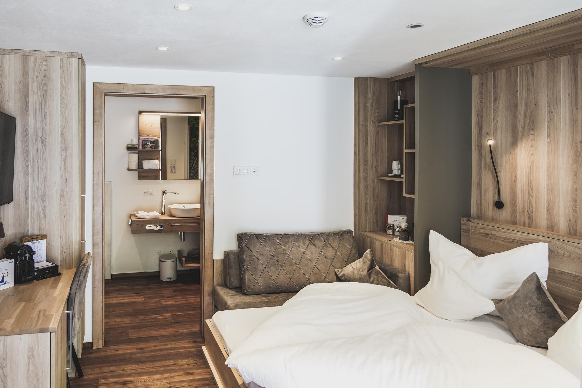 Doppelbett im Doppelzimmer Freiraum im Ur-Genuss in Heiterwang