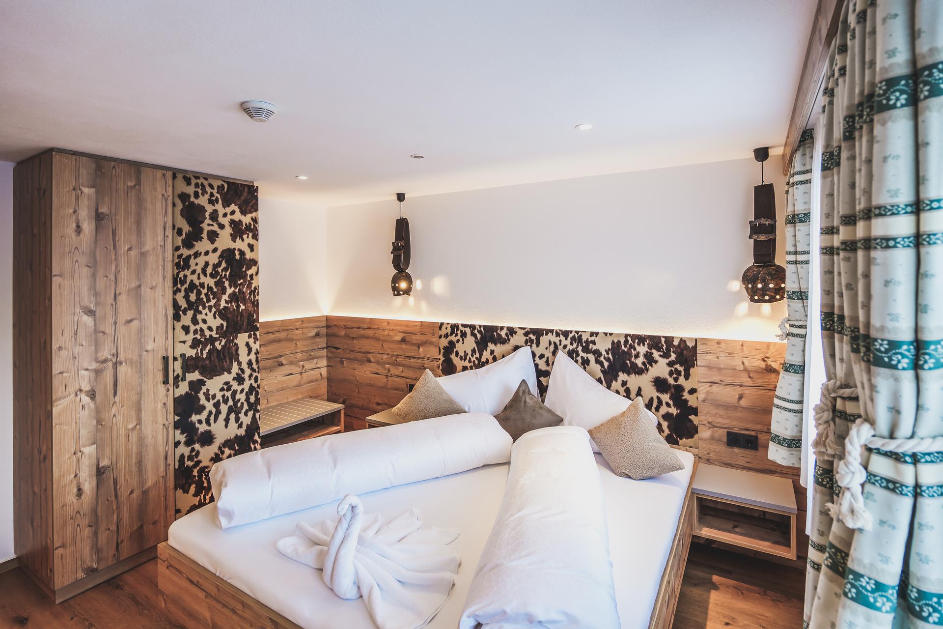 Schlafzimmer in der Ferienwohnung Kuhstall im Ur-Genuss in Heiterwang