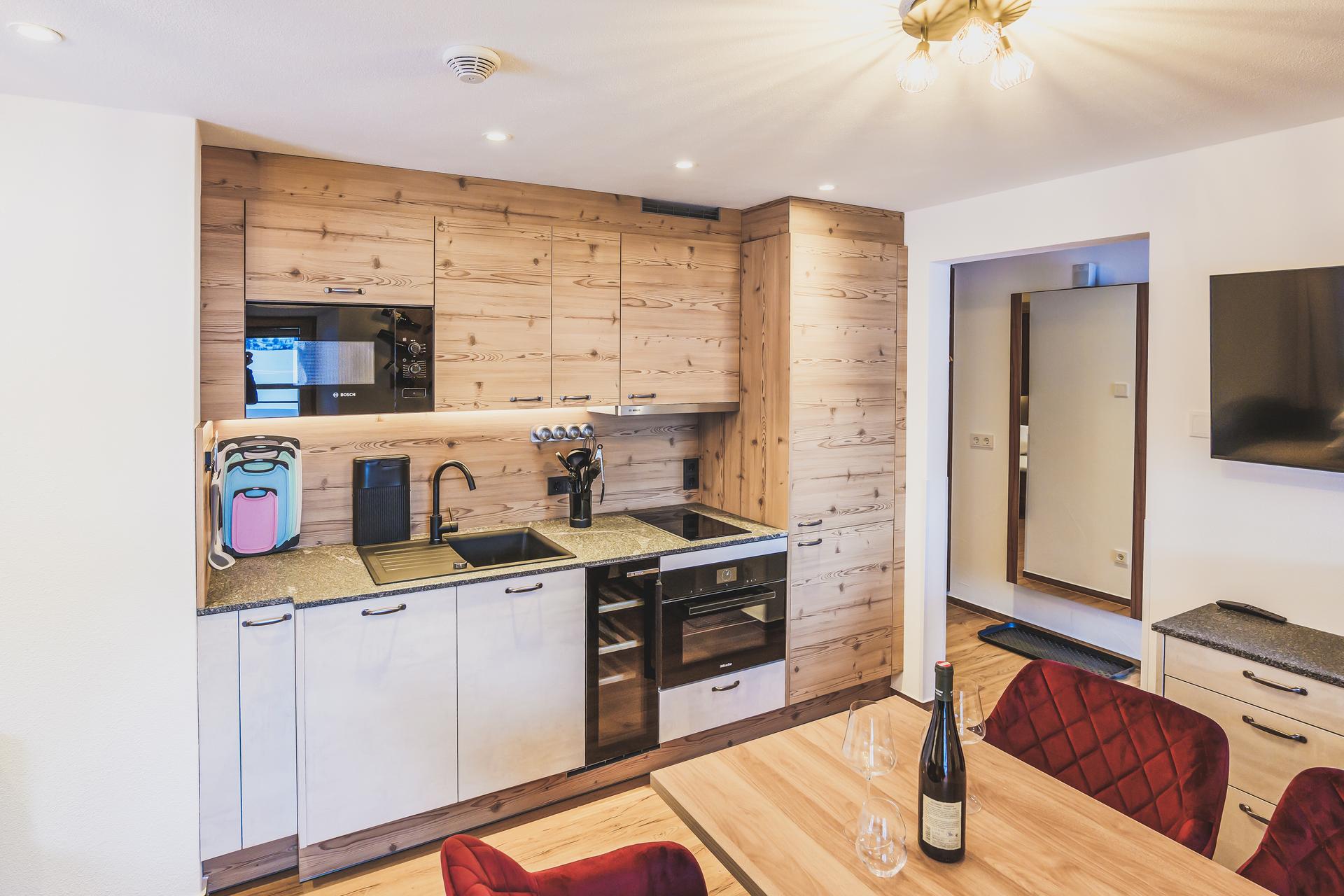 Holzküche in der Ferienwohnung Schlafkammer im Ur-Genuss in Heiterwang