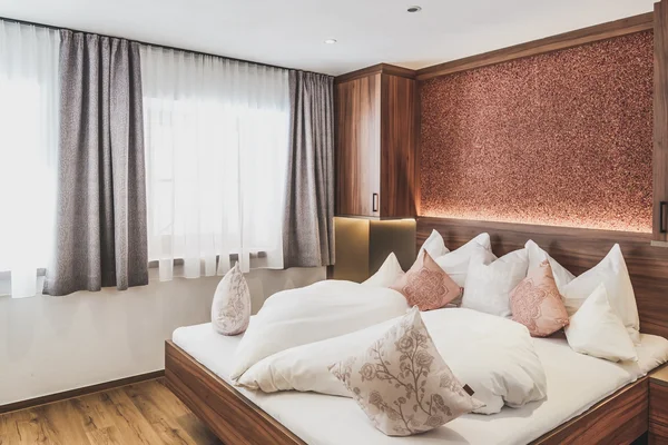 Schlafzimmer im Appartement Schlafkammer im Ur-Genuss in Heiterwang