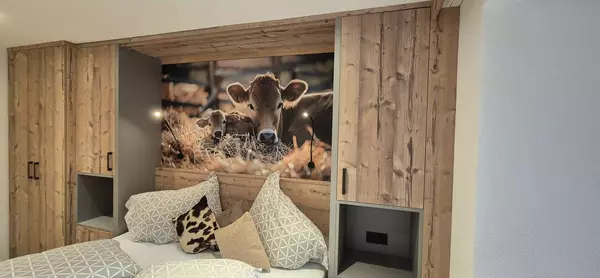 Schlafzimmer Ur-Genuss Ferienwohung Kuhstall Heiterwang
